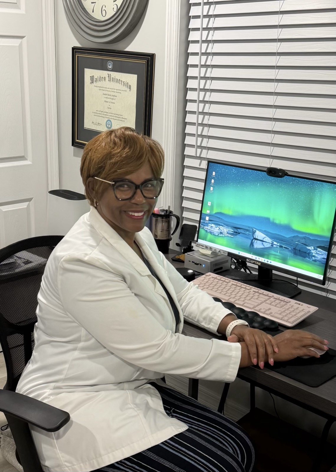 Sheilah Battle-Stephens at her desk